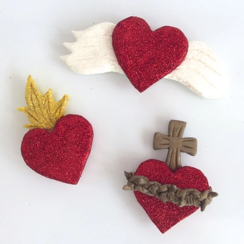 Air Dry Clay Sacred Heart Magnets Set - make these sacred heart magnets with air dry clay. Such a fun project!